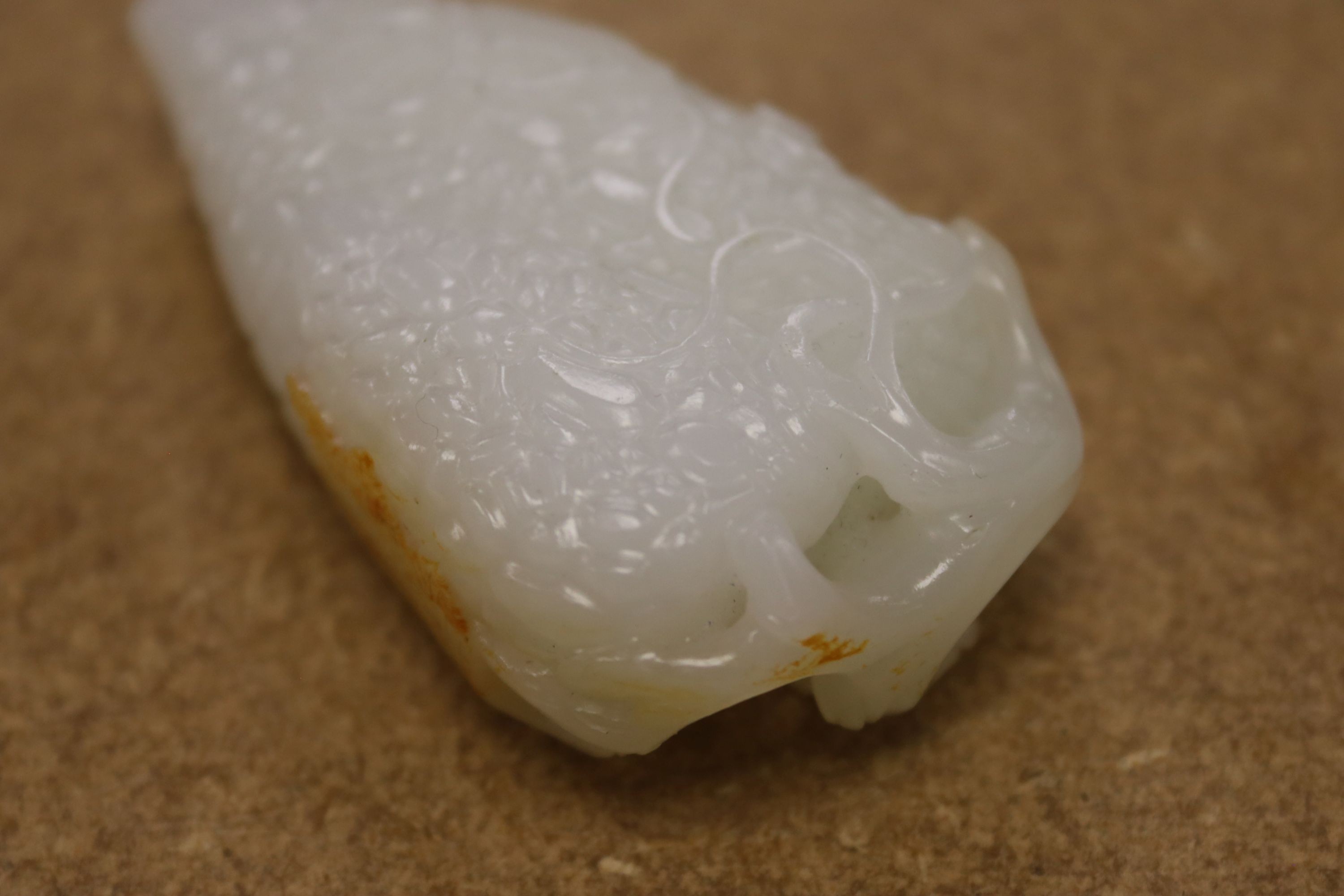 A Chinese white and russet skin jade carving, 7cm high